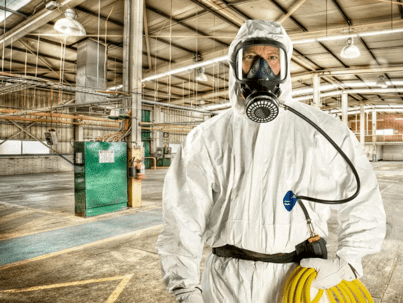 technician in biohazard equipment